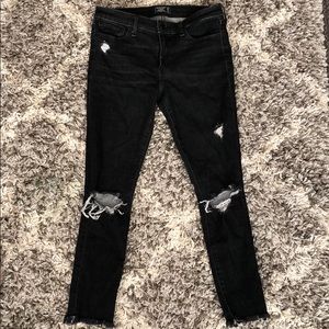 black distressed jeans